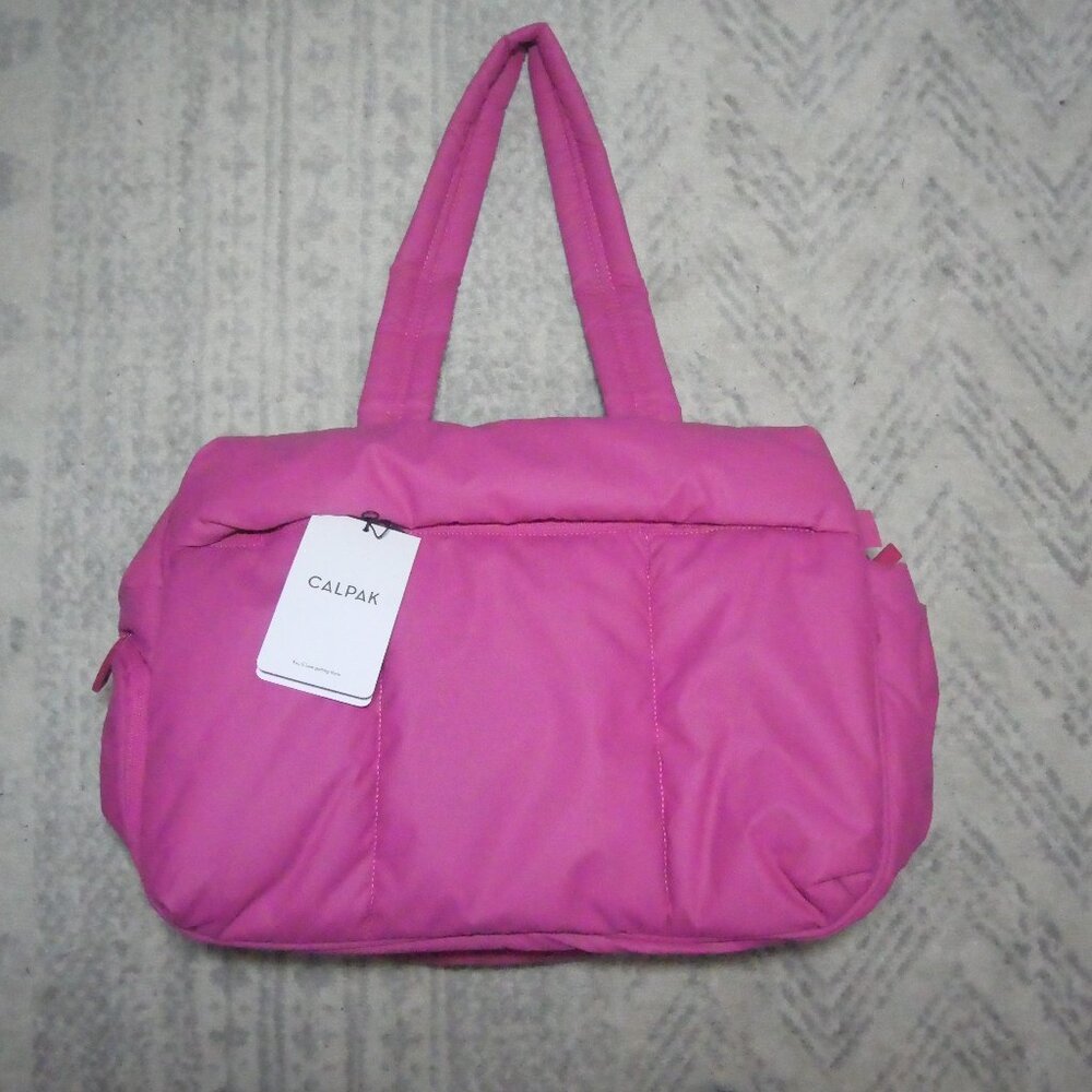 Calpak Luka Duffel in DragonFruit